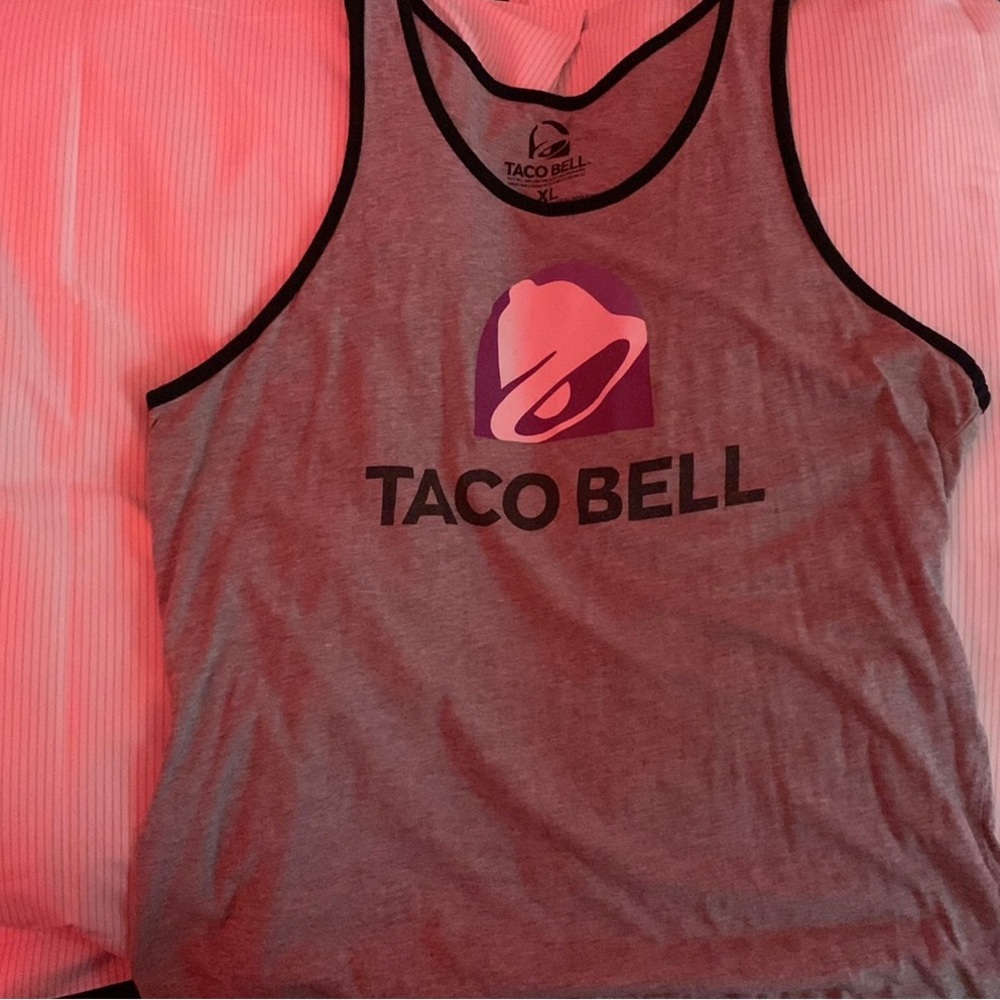 Tank top with logo of Taco Bell,‘TACO BELL’ labeled in bold font underneath logo